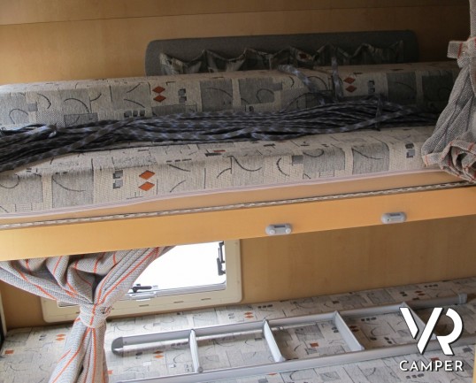 Roller Team Granduca 64: camper usato mansardato con letti a castello in coda, 5 posti omologato, ottimo per le vacanze in famiglia.