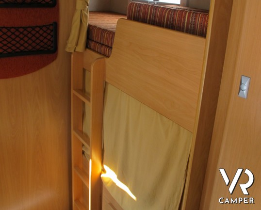 Challenger Mageo 142 - camper mansardato usato, 7 posti letto, con doppia dinette e letti a castello laterali, su meccanica Ford, concessionaria torin