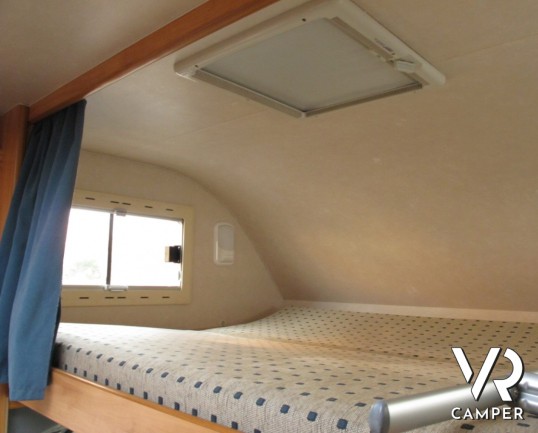 Adria Coral 660: camper mansardato usato, 6 posti letto, con ampia dinette, portabici, garage, rampa per moto, ottimo per famiglie, concessionaria cam