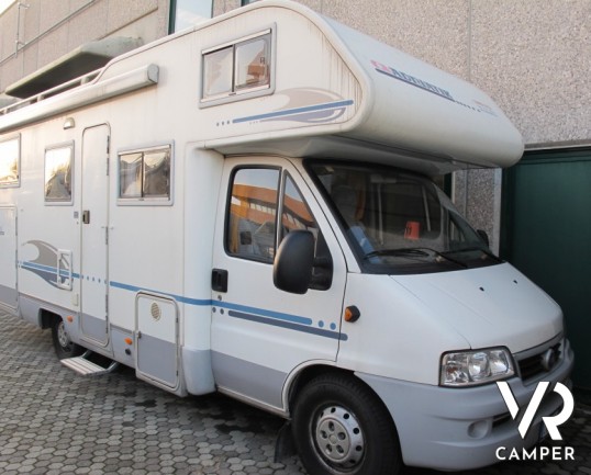 Adria Coral 660: camper mansardato usato, 6 posti letto, con ampia dinette, portabici, garage, rampa per moto, ottimo per famiglie, concessionaria cam