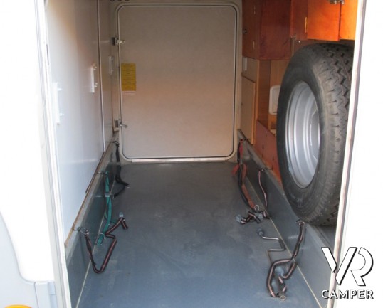 Adria Coral 660 SP: camper usato mansardato a Torino con ampio garage sotto i 7 metri di lunghezza.