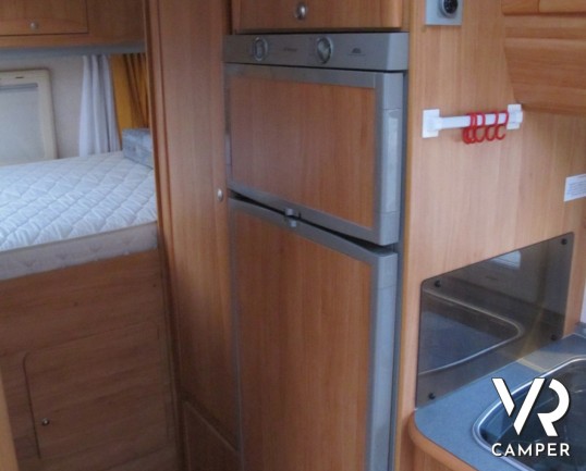 Adria Coral 680 SP: camper semintegrale usato con garage e letto matrimoniale posteriore, pochissimi chilometri su meccanica Fiat Ducato