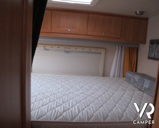 Adria Coral 680 SP: camper semintegrale usato con garage e letto matrimoniale posteriore, pochissimi chilometri su meccanica Fiat Ducato