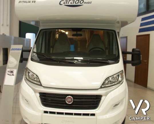 CARADO A 461: camper mansardato nuovo con doppia dinette e letti a castello in coda abbinati al garage