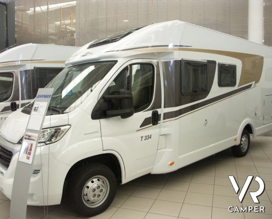 CARADO T 334: semintegrale nuovo con garage, lunghezza 6.99 metri, bagno e doccia separati e doppio armadio.