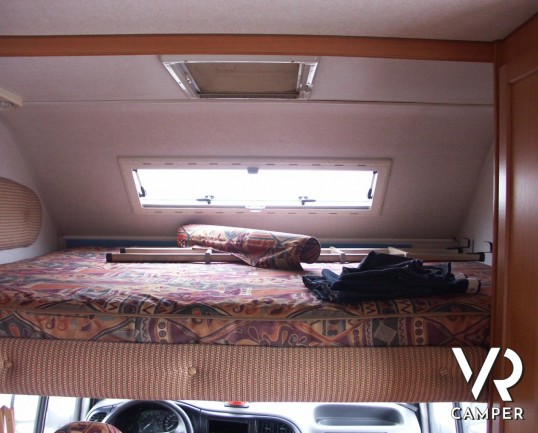 Elnagh Doral 108: camper mansardato usato in vendita a Torino con garanzie, dinette classica e letti a castello laterali su meccanica Ford Transit.