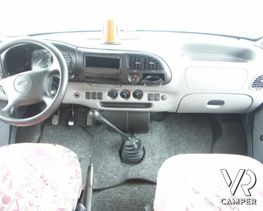 Elnagh Doral 108: camper mansardato usato in vendita a Torino con garanzie, dinette classica e letti a castello laterali su meccanica Ford Transit.