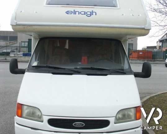 Elnagh Doral 108: camper mansardato usato in vendita a Torino con garanzie, dinette classica e letti a castello laterali su meccanica Ford Transit.