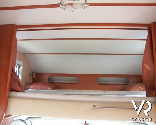 HOBBY TOSKANA 615: camper mansardato usato a Torino con letti a castello posteriori