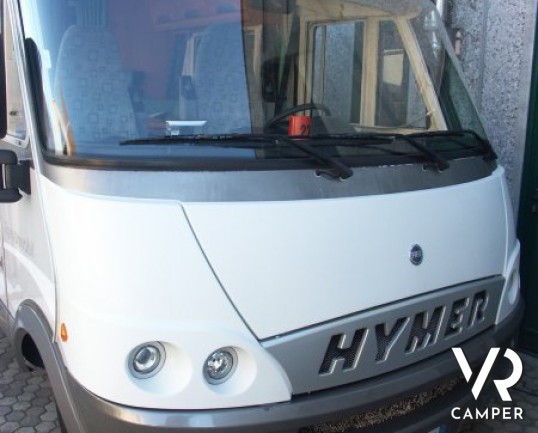 Hymer B 614 G: camper usato motorhome con garage posteriore, generatore di corrente, condizionatore a tetto.