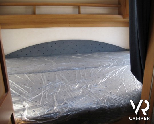 Hymer B-Klasse 644: motorhome con garage ampio, doppio pavimento AL-KO con gavoni passanti e condizionatore in cabina.