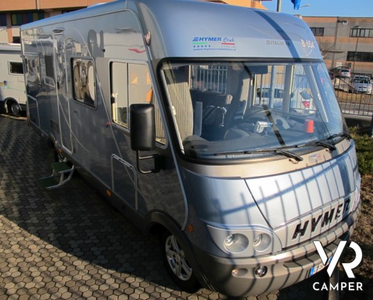 Hymer B 654: Hymoer motorhome usato con letto alla francese, cambio automatico, doppio divanetto anteriore, cerchi in lega e colorazione esterna azzur