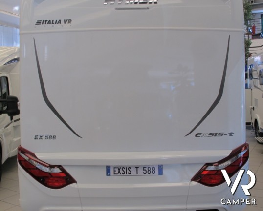 Hymer Exsis-T 588: camper Hymer semintegrale nuovo con letti gemelli posteriori, ampio garage, lunghezza 699
