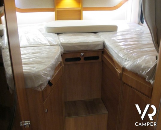 Hymer Exsis-T 588: camper Hymer semintegrale nuovo con letti gemelli posteriori, ampio garage, lunghezza 699