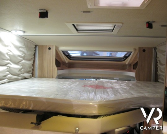 Hymer Tramp 578 GL: camper semintegrale nuovo Hymer sotto i 7 metri con letti gemelli posteriori e garage, 4 posti omologati.