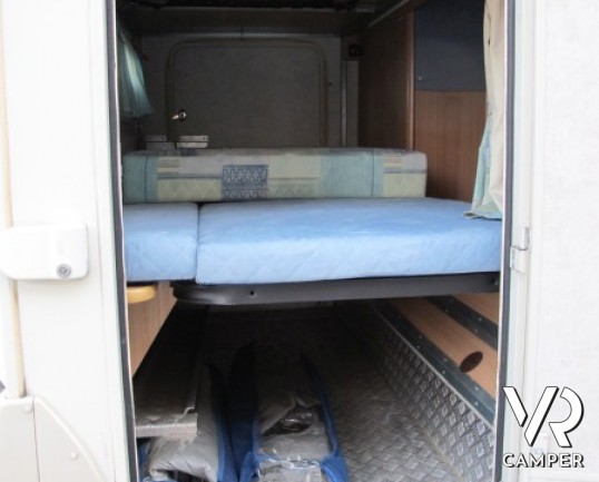 Kentucky Estro 6S: camper usato mansardato su meccanica Ford da 140CV, con letti a castello in coda, dinette avanzata con divano laterale e full optio