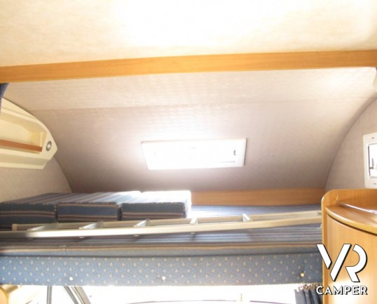 Rimor SuperBrig 677 TC: camper usato a Torino con garage per caricare la moto, bagno con doccia separata