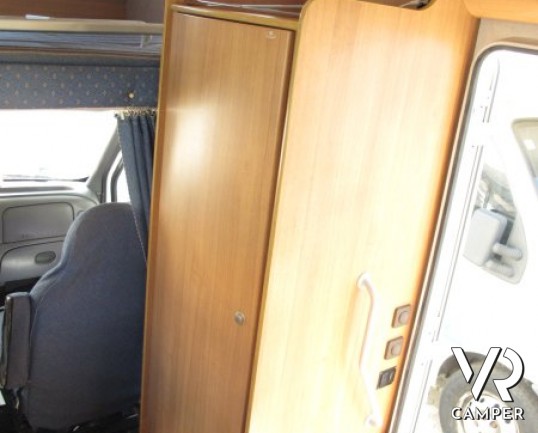 Rimor SuperBrig 677 TC: camper usato a Torino con garage per caricare la moto, bagno con doccia separata