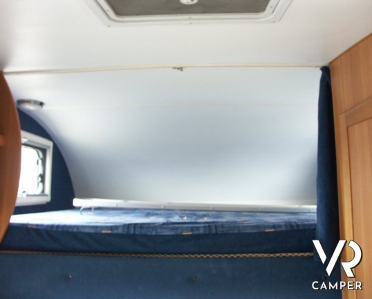 Roller Team Granduca 64: camper mansardato con letti a castello posteriori e ampio garage