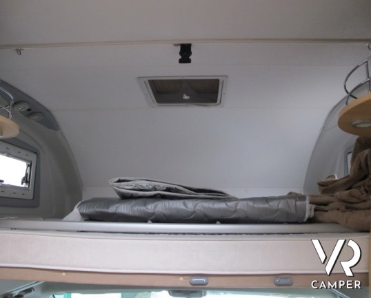 Roller Team Granduca Garage: camper mansardato usato con garage, ampia dinette, pochissimi chilometri, ottimi spazi di carico.