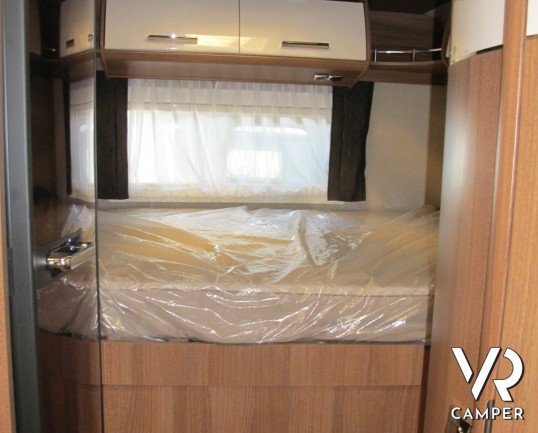Carthago C-Compactline I 138 DB_camper motorhome_letto matrimoniale_letto basculante_4 posti letto_ frigorifero grande_ampia dinette_garage biciclette