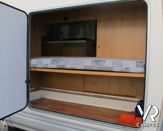 Elnagh Clipper 50: camper mansardato usato 7 posti, con doppia dinette, dotato di veranda e portabici. ItaliaVR vendita camper nuovi e usati a Torino