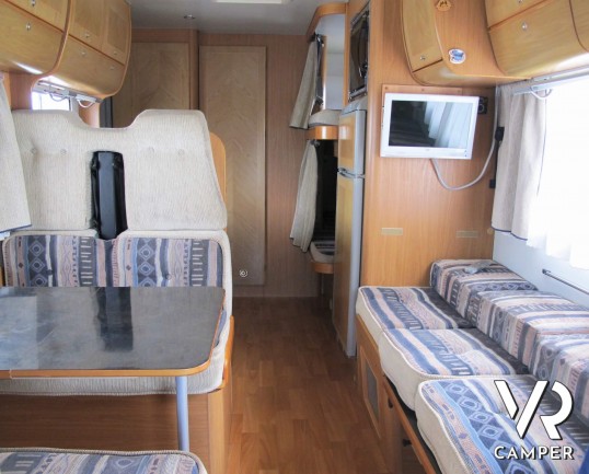 Mobilvetta Icaro S7 - camper usato mansardato con letti a castello, dinette comoda e trasformabile, bagno con doccia separata, veranda, portabici, osc