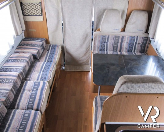 Mobilvetta Icaro S7 - camper usato mansardato con letti a castello, dinette comoda e trasformabile, bagno con doccia separata, veranda, portabici, osc