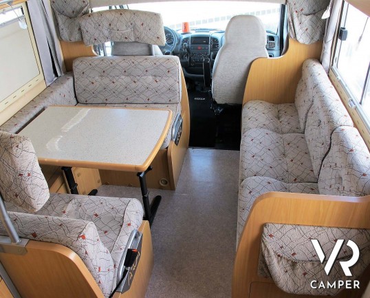 Arca 715 GLT: camper usato mansardato ideale per famiglie, con 7 posti letto, letti a castello in coda, veranda, portabici, su meccanica Ducato 146 cv