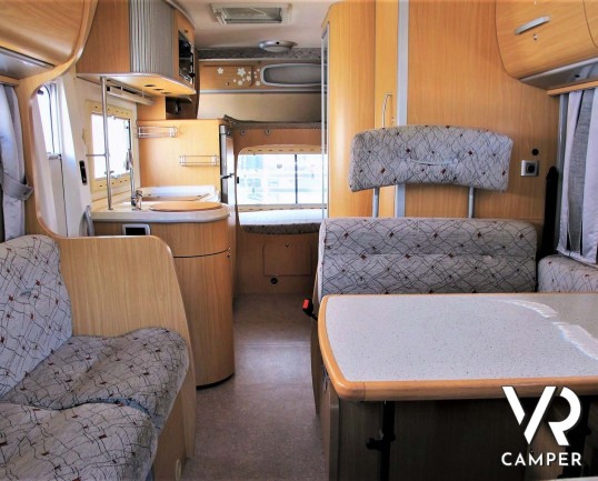 Arca 715 GLT: camper usato mansardato ideale per famiglie, con 7 posti letto, letti a castello in coda, veranda, portabici, su meccanica Ducato 146 cv