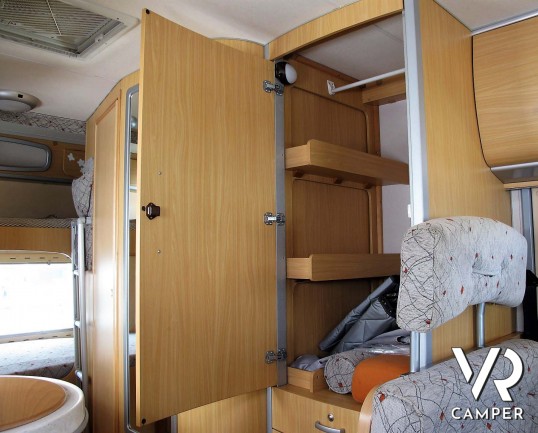 Arca 715 GLT: camper usato mansardato ideale per famiglie, con 7 posti letto, letti a castello in coda, veranda, portabici, su meccanica Ducato 146 cv