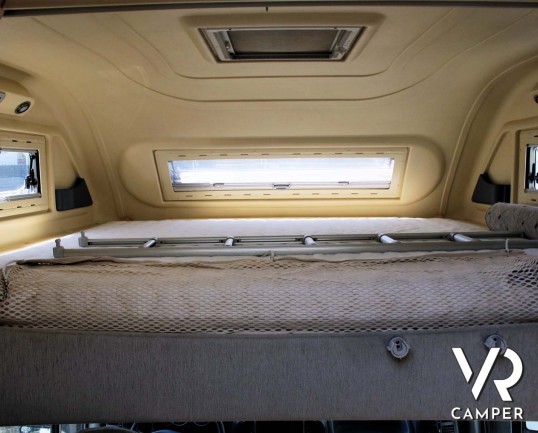 Arca 715 GLT: camper usato mansardato ideale per famiglie, con 7 posti letto, letti a castello in coda, veranda, portabici, su meccanica Ducato 146 cv