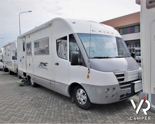 Laika Ecovip H 710 motorhome usato con 7 posti letto, ideale per famiglie, con veranda, climatizzatore, oscurante termico, portabici