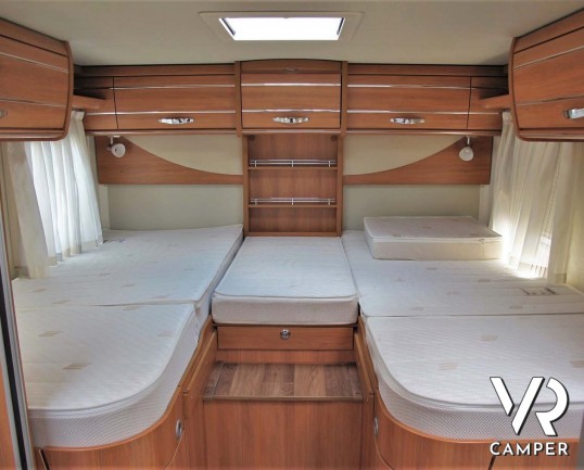 Hymer Tramp 678 CL: camper semintegrale usato con 5 posti omologati, dotato di letti gemelli posteriori e letto basculante.In vendita da Italia VR a T