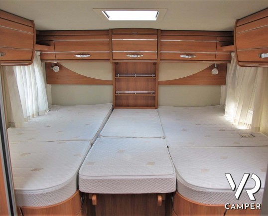 Hymer Tramp 678 CL: camper semintegrale usato con 5 posti omologati, dotato di letti gemelli posteriori e letto basculante.In vendita da Italia VR a T