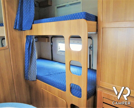 Arca America 407 - camper mansardato usato con 7 posti letto, dotato di veranda, portabici, portatutto, antenna tv, climatizzatore. Su Fiat Ducato 127