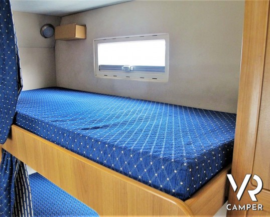 Arca America 407 - camper mansardato usato con 7 posti letto, dotato di veranda, portabici, portatutto, antenna tv, climatizzatore. Su Fiat Ducato 127
