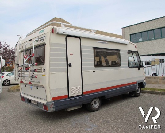 Elnagh Magnum 561 - camper motorhome usato 5 posti, su Ducato 2.500 D. Dotato di veranda, antenna tv, portabici, 2° serbatoio acqua, ventolone oblò. I
