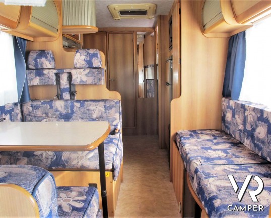 Rimor Super Brig 728 - camper mansardato usato con 7 posti letto, su Mercedes 312 2,9 TDI (123 CV). Lungo 7,43 mt. Ideale per viaggi di famiglia. Ital