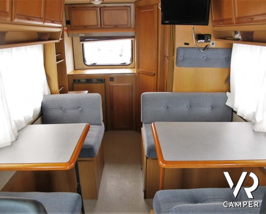 Elnagh Magnum 561 - camper motorhome usato 5 posti, su Ducato 2.500 D. Dotato di veranda, antenna tv, portabici, 2° serbatoio acqua, ventolone oblò. I