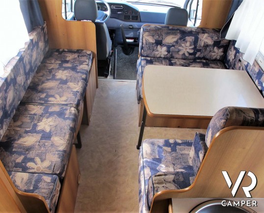 Rimor Super Brig 728 - camper mansardato usato con 7 posti letto, su Mercedes 312 2,9 TDI (123 CV). Lungo 7,43 mt. Ideale per viaggi di famiglia. Ital