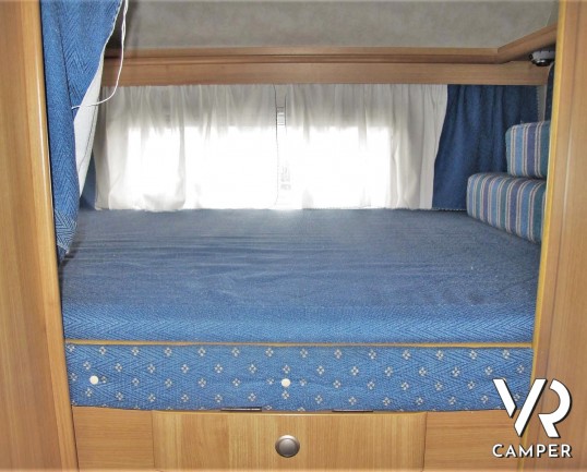 Rimor Super Brig 687 TC: camper mnsardato usato con 6 posti letto, su motore Ford 140 CV. Dotato di condizionatore, tendalino, sospensioni, gancio traino. Italia VR vendita camper Piemonte