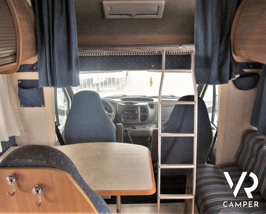 Rimor Super Brig 687 TC: camper mnsardato usato con 6 posti letto, su motore Ford 140 CV. Dotato di condizionatore, tendalino, sospensioni, gancio traino. Italia VR vendita camper Piemonte