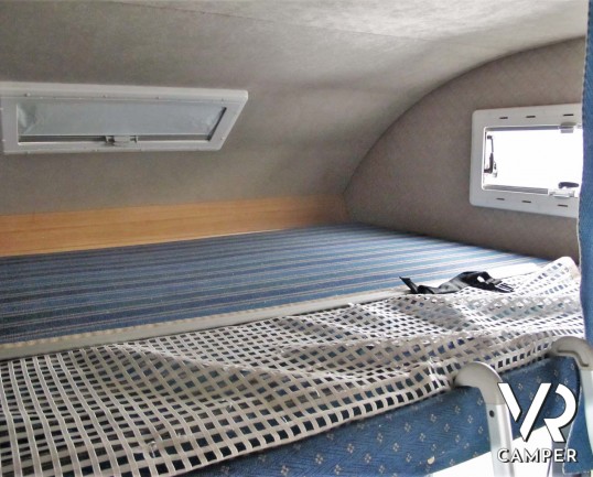 Rimor Super Brig 687 TC: camper mnsardato usato con 6 posti letto, su motore Ford 140 CV. Dotato di condizionatore, tendalino, sospensioni, gancio traino. Italia VR vendita camper Piemonte