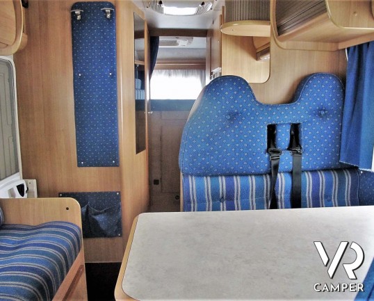 Rimor Super Brig 687 TC: camper mnsardato usato con 6 posti letto, su motore Ford 140 CV. Dotato di condizionatore, tendalino, sospensioni, gancio traino. Italia VR vendita camper Piemonte