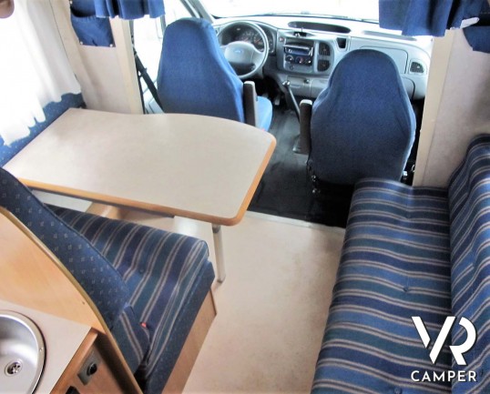 Rimor Super Brig 687 TC: camper mnsardato usato con 6 posti letto, su motore Ford 140 CV. Dotato di condizionatore, tendalino, sospensioni, gancio traino. Italia VR vendita camper Piemonte