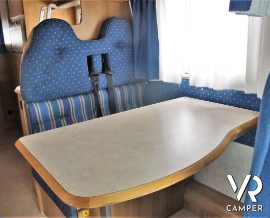 Rimor Super Brig 687 TC: camper mnsardato usato con 6 posti letto, su motore Ford 140 CV. Dotato di condizionatore, tendalino, sospensioni, gancio traino. Italia VR vendita camper Piemonte