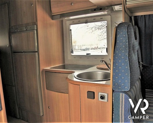 Rimor Super Brig 687 TC: camper mnsardato usato con 6 posti letto, su motore Ford 140 CV. Dotato di condizionatore, tendalino, sospensioni, gancio traino. Italia VR vendita camper Piemonte