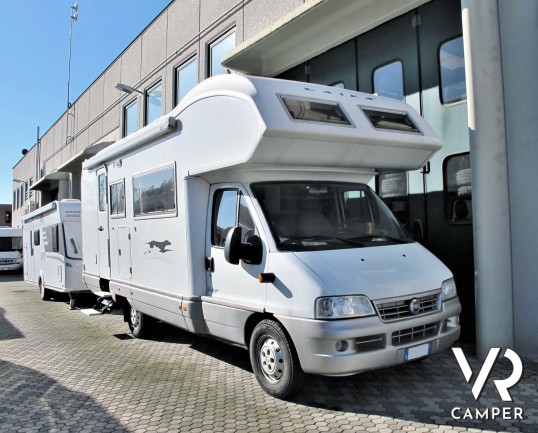 Laika Ecovip 2.1 - Camper usato mansardato con 7 posti letto, dotato di portabici, veranda, antenna TV, tavolo dinette prolungabile. In vendita da VR Camper a Druento - Torino