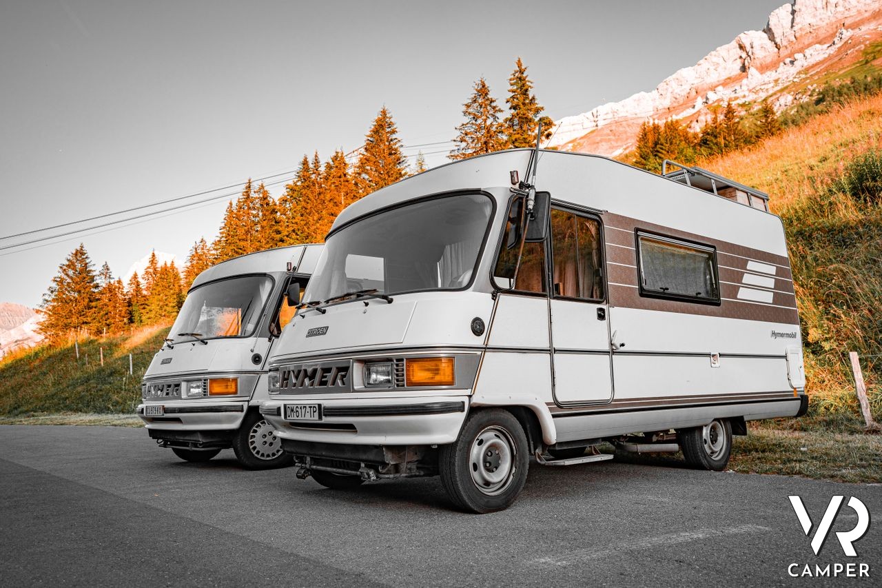 Camper Hymer motorhome usati parcheggiati davanti alle montagne